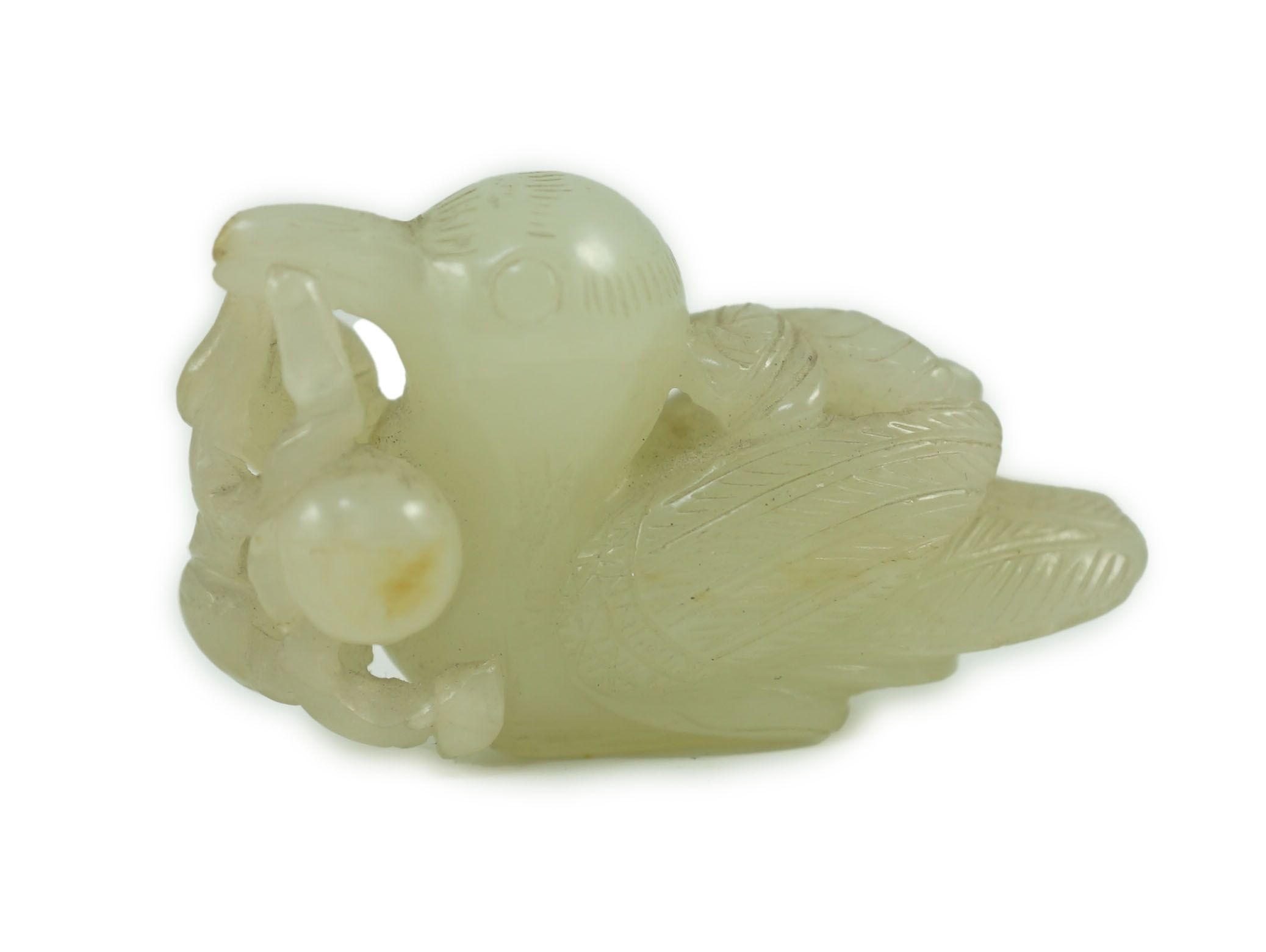 A Chinese pale celadon jade figure of a bird grasping a fruit sprig, 18th/19th century, 5.1 cm long